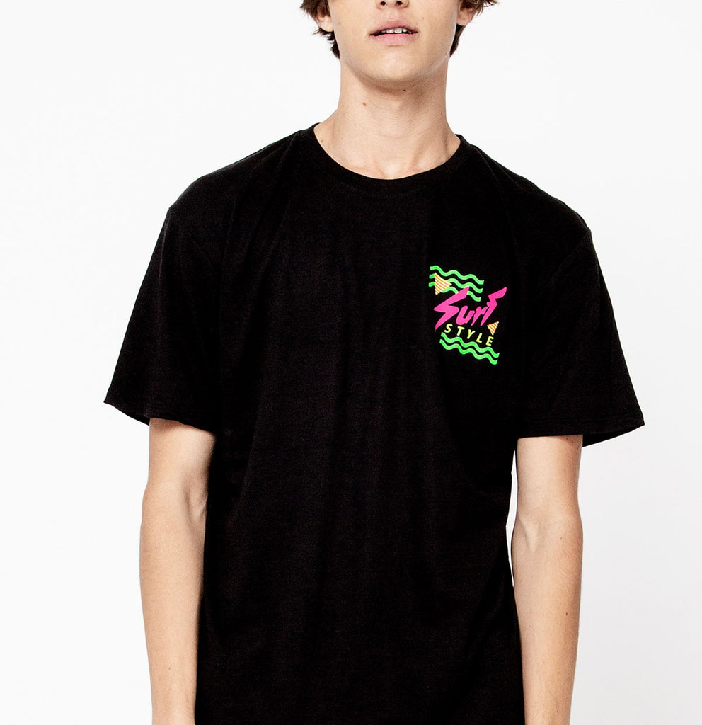 male front view wearing Retro Neon Surf Style Logo t shirt